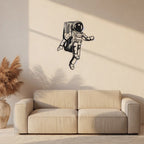Floating Astronaut Metal Strip Wall Art