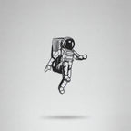 Floating Astronaut Metal Strip Wall Art
