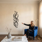 Abstract Flame Swirl Vertical Metal Wall Art in an elegant living room | Cutts & Pieces Egypt