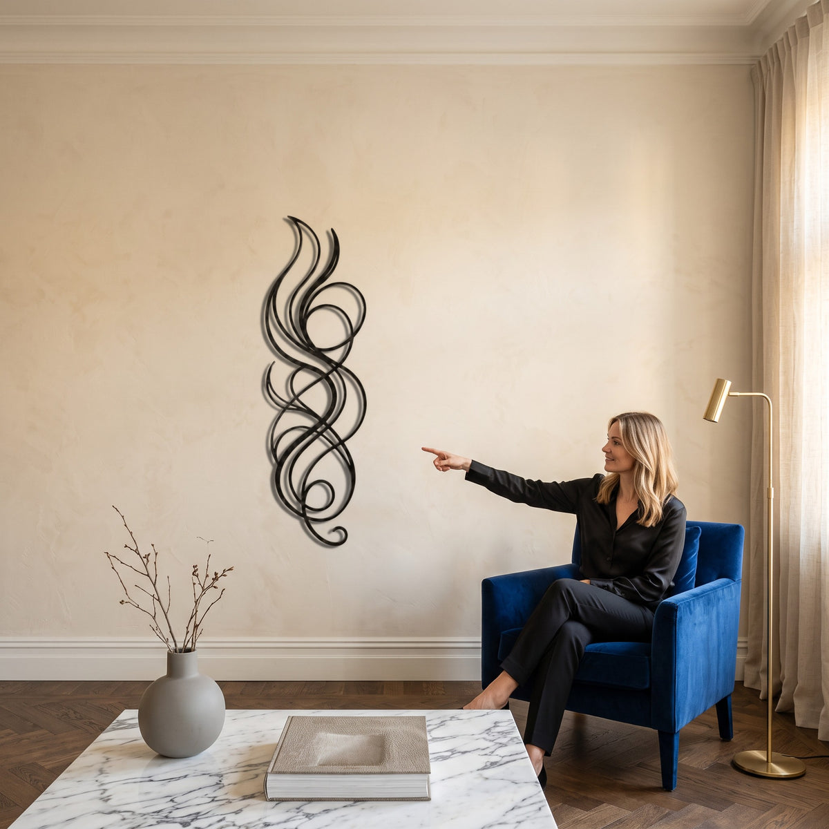 Abstract Flame Swirl Vertical Metal Wall Art in an elegant living room | Cutts & Pieces Egypt