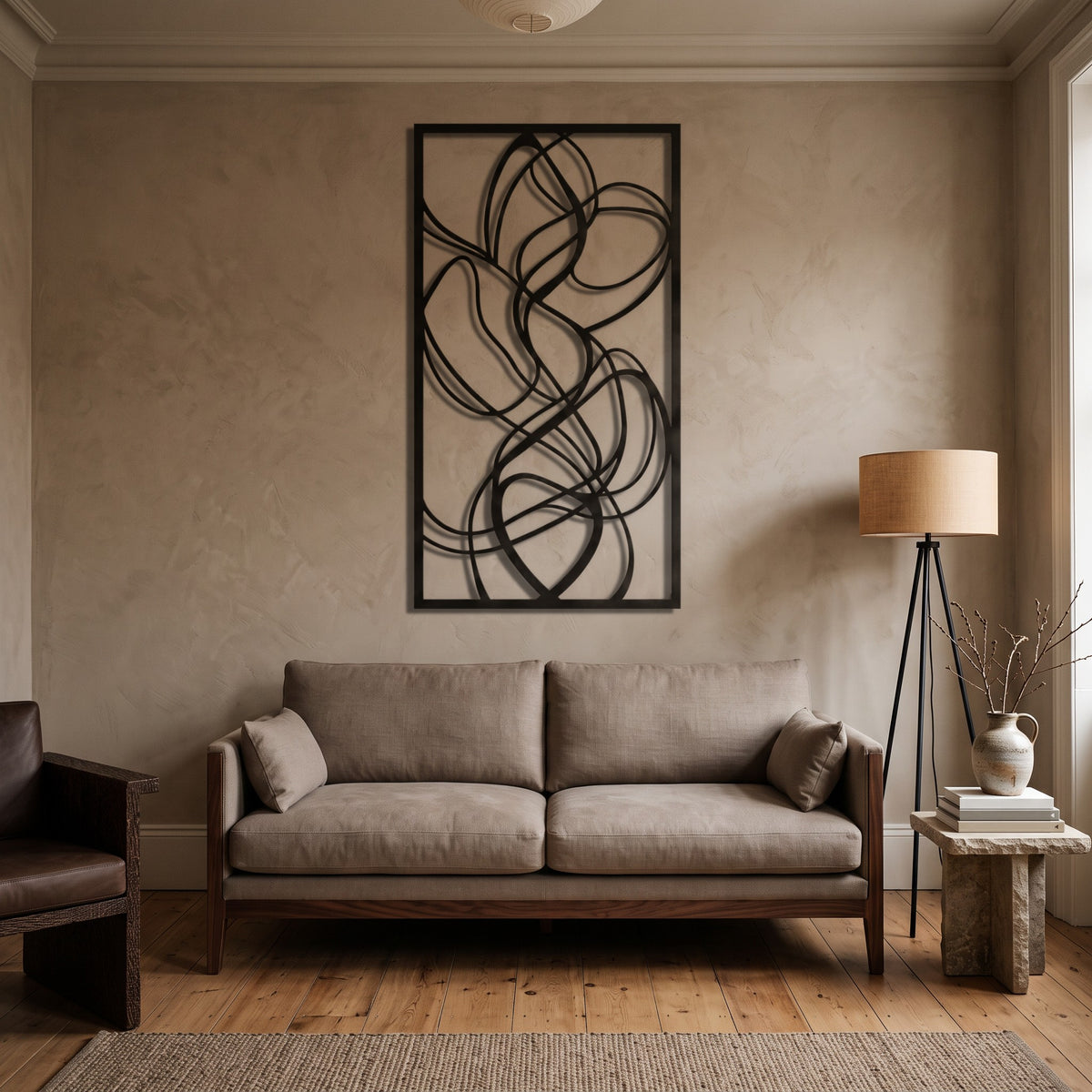 Framed Abstract Loops Metal Wall Art above a sofa in a modern living room | Cutts & Pieces Egypt