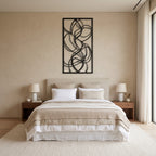Framed Abstract Loops Metal Wall Art above the bed in a modern bedroom