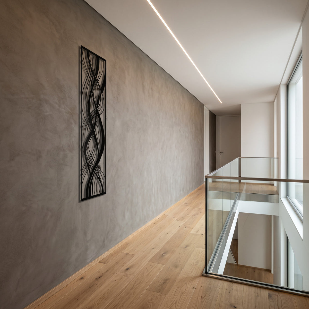 Framed Abstract Waves Vertical Metal Wall Art, side view in a modern hallway